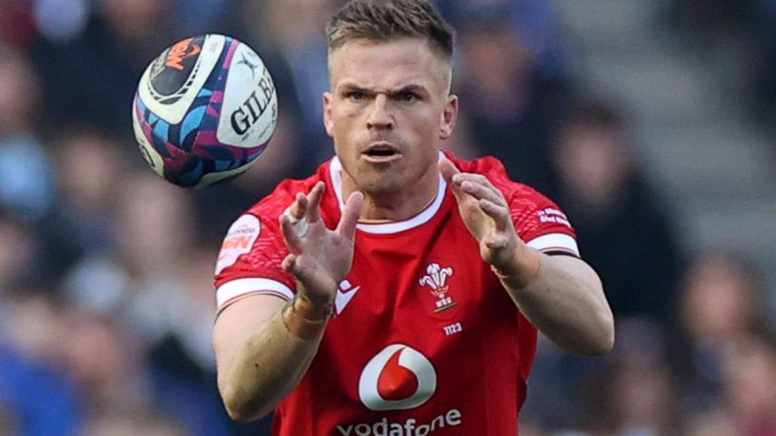 Gareth Anscombe keeps his eyes on the ball as it travels towards him