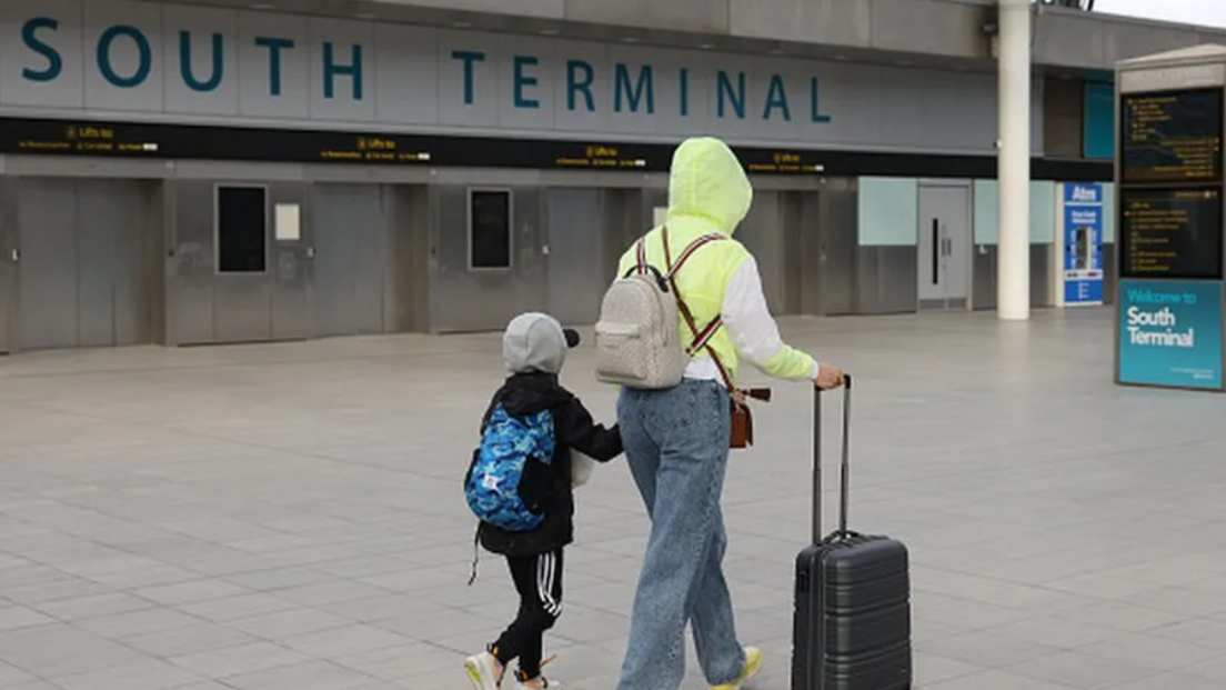 Passengers arriving at Gatwick Airport's South Terminal