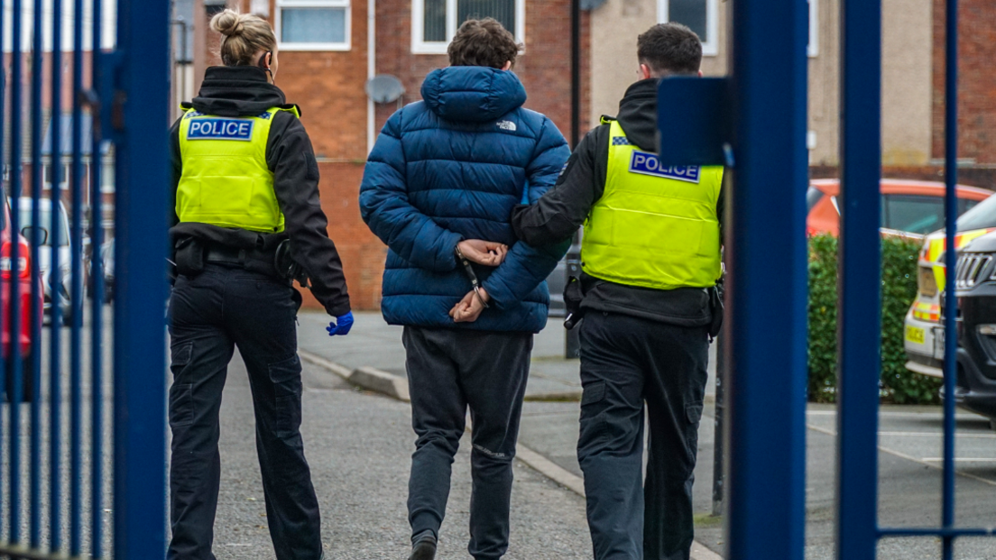 Police officers with a suspect