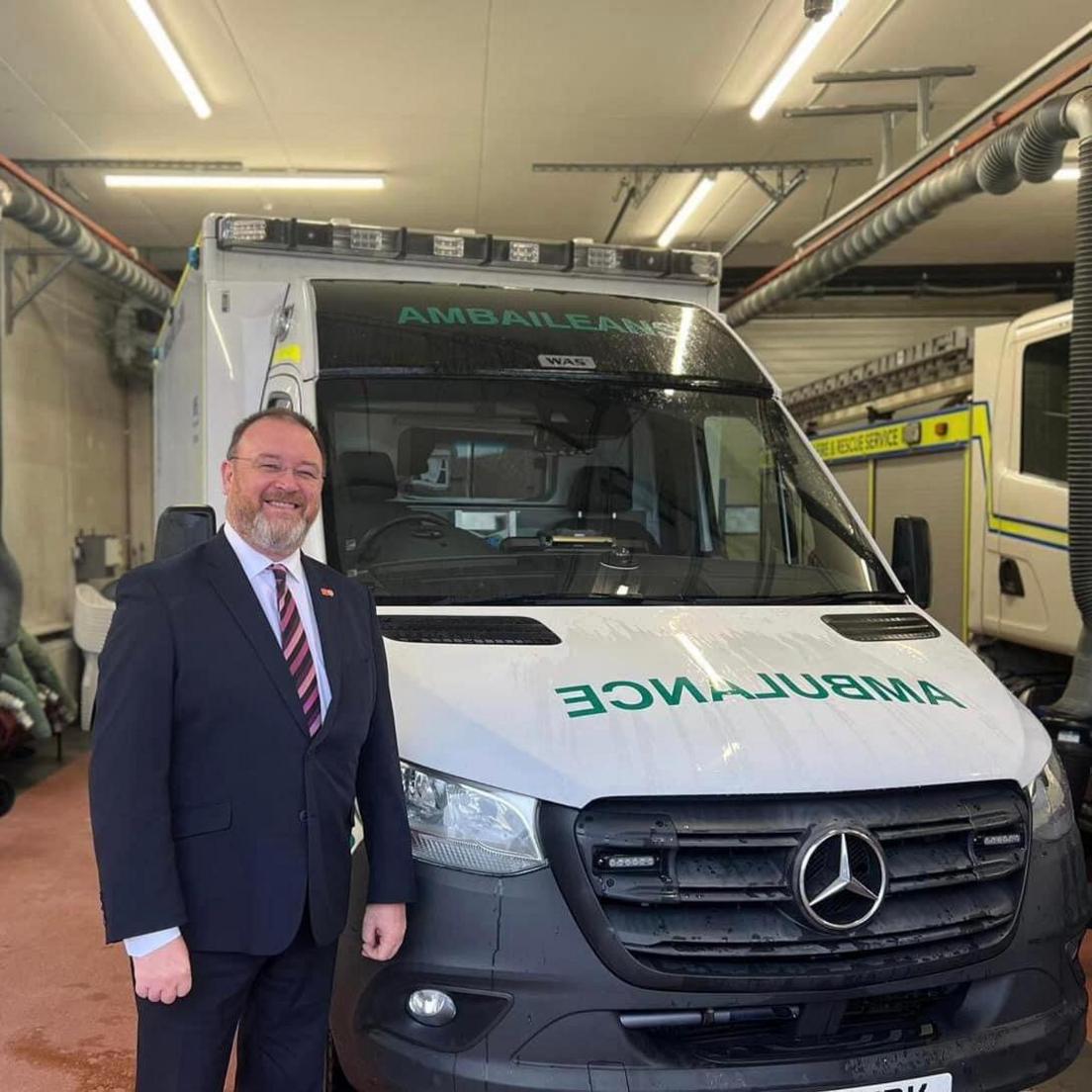 David Duguid with ambulance he campaigned for 