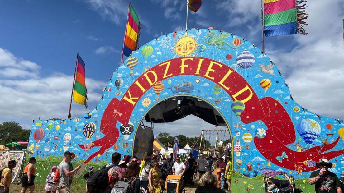 A large blue sign showing the entrance to the kidz field. 