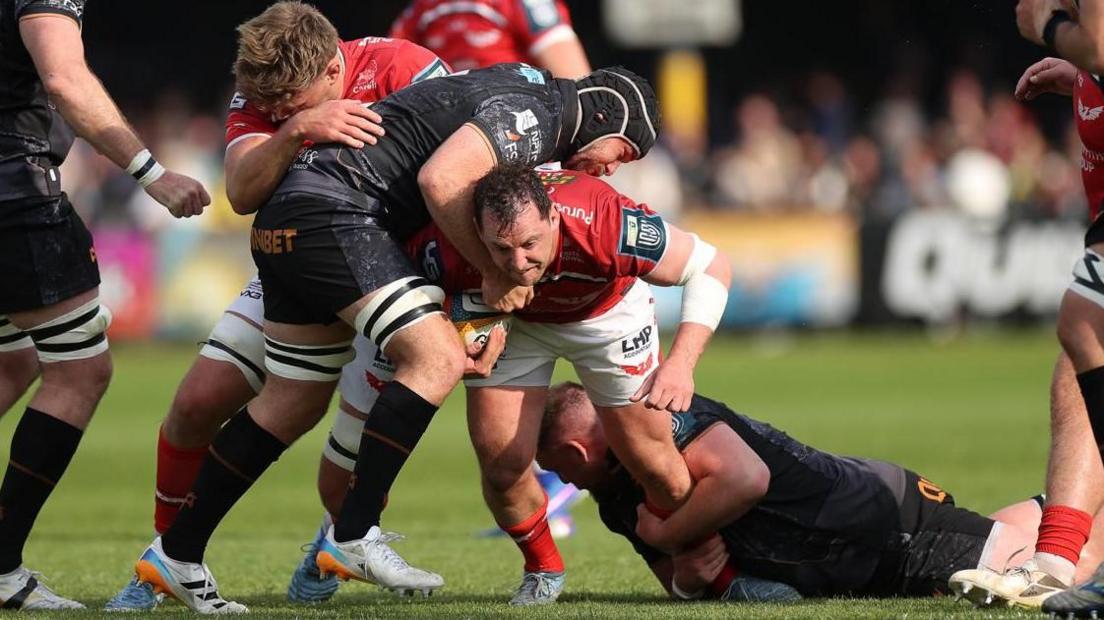 Scarlets hooker Ryan Elias carries the ball at Ospreys