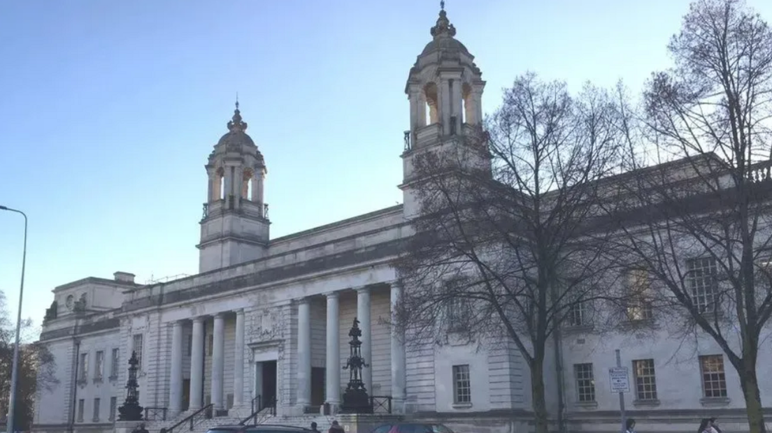 Outside of Cardiff Crown Court with bare trees in front of it