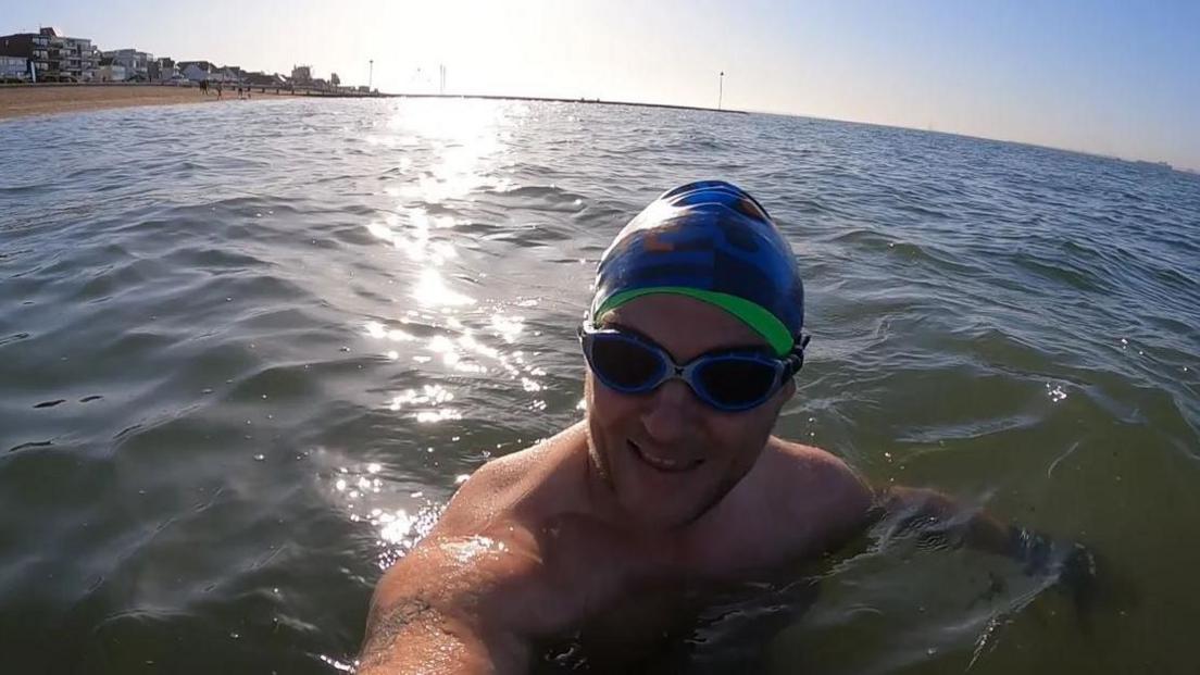 Paul Slade swimming in waters off Chalkwell Beach