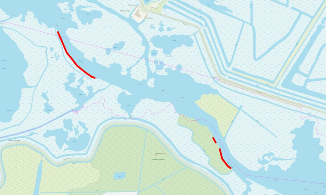 A digital map shows a bird's eye view of a network of waterways and land, with two mooring areas marked in red.