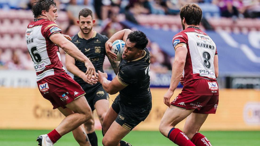 Forward Herman Ese'ese piles pressure on Wigan in Hull FC win