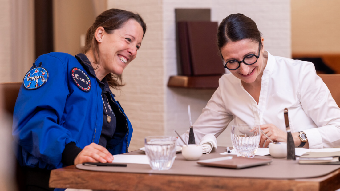 Astronaut Sophie Adenot and chef Anne-Sophie Pic smiling.