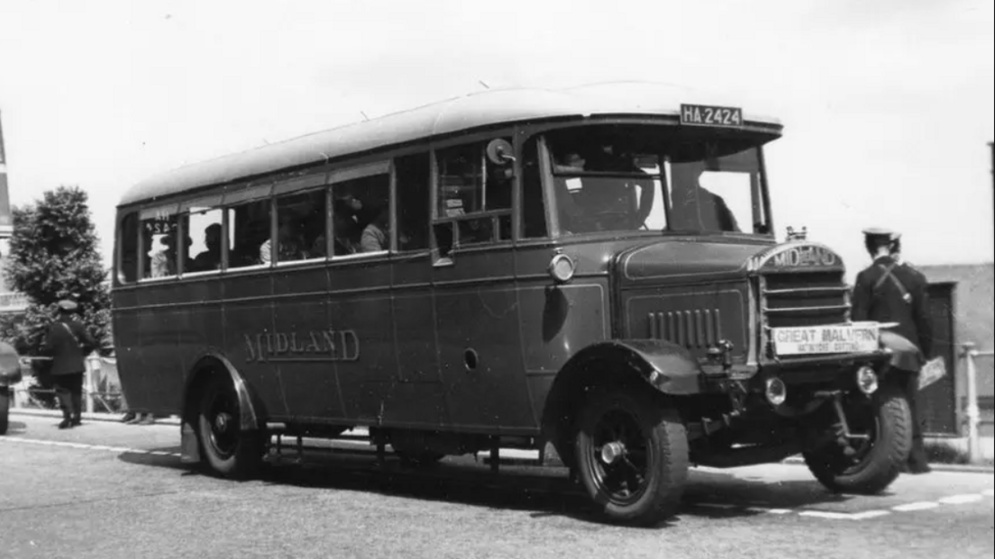 A black and white picture of a 1924 single-decker Midland Red bus