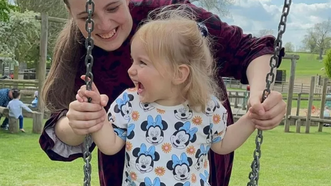 Chelsea Gleason-Mitchell playing on a swing with her late daughter Isabella Rose Wheildon