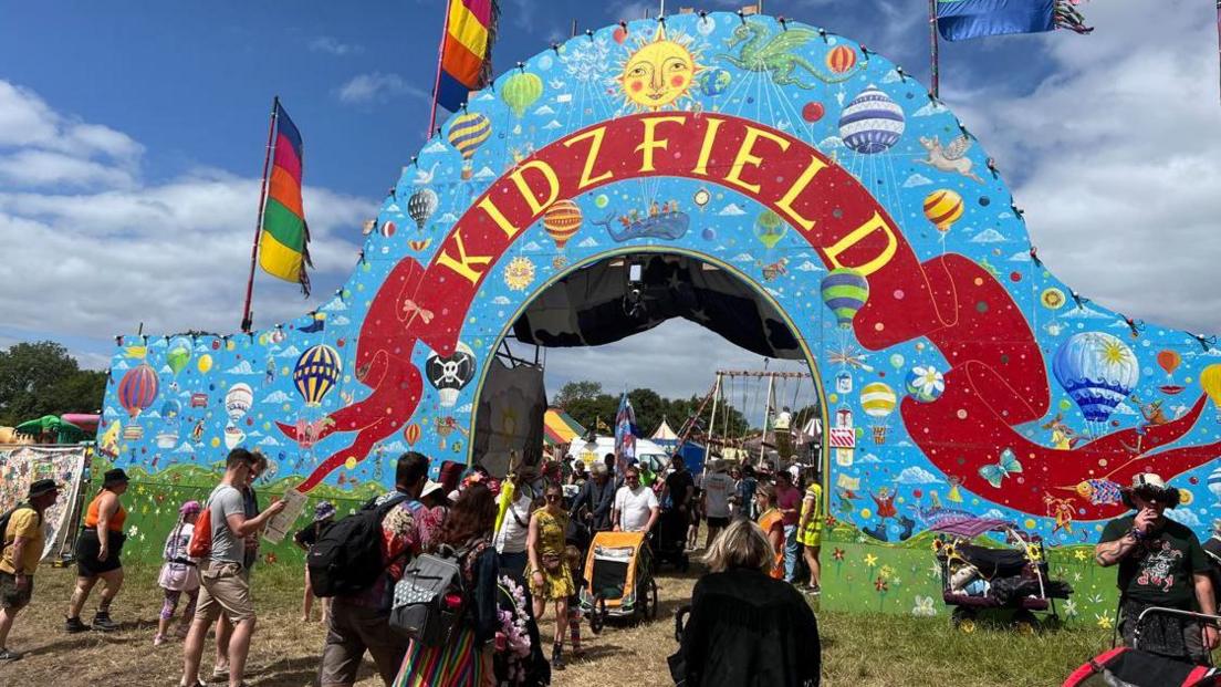 A large blue sign showing the entrance to the kidz field.