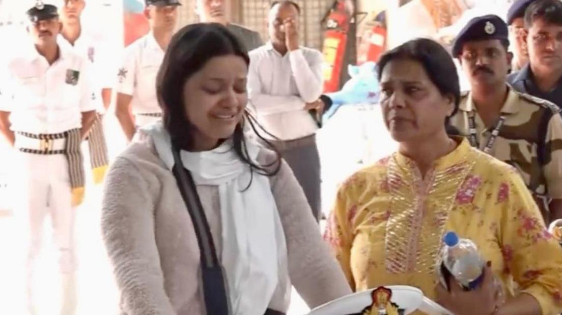 The photograph shows Himanshi Narwal crying as she bid farewell to her husband