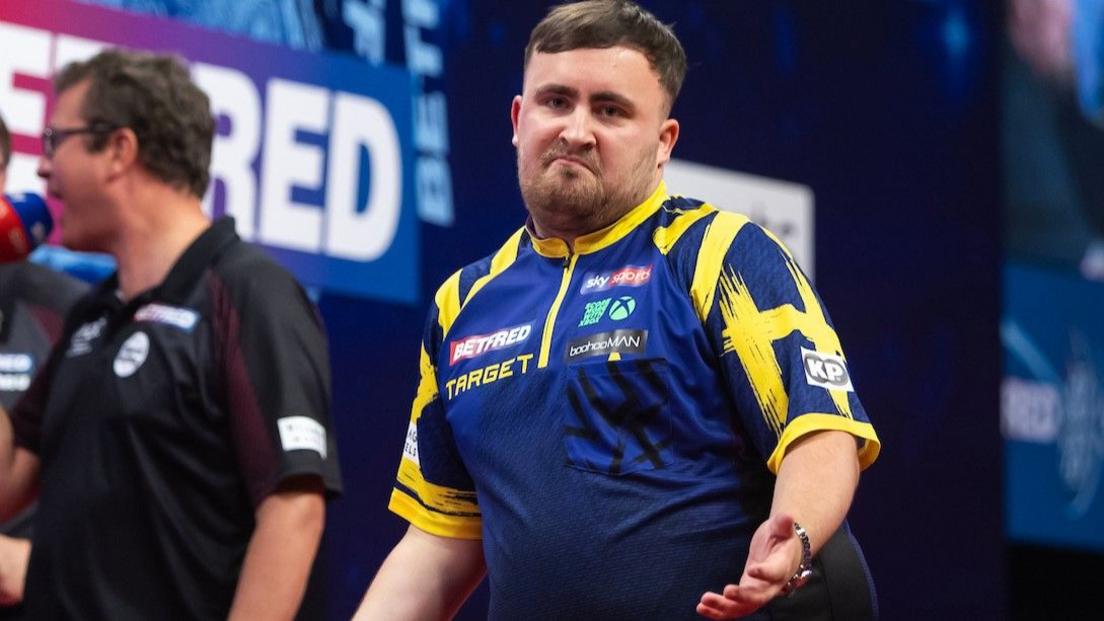 Luke Littler gives a motion aft hitting a nine-darter against Josh Rock