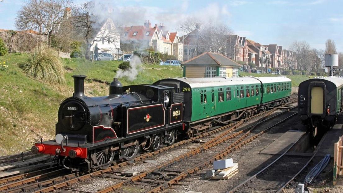 The two rare 1940s Bulleid passenger carriages at Swanage Railway