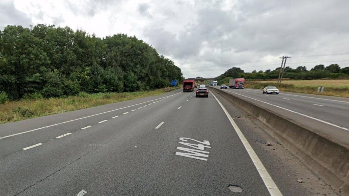 A generic image showing the M42 southbound on the left, between junction 10 and 9, and vehicles both southbound and northbound