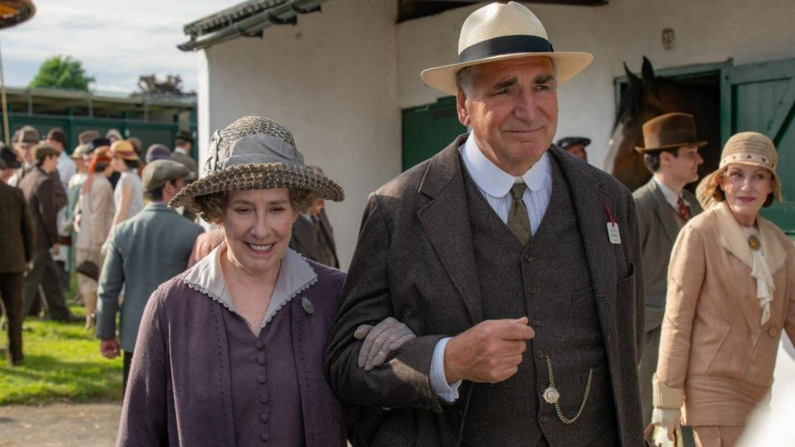 Actor Jim Carter and actress Penelope Wilton on the set of the new Downton film
