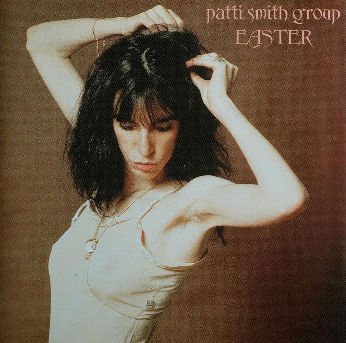 Cover of Patti Smith's album Easter showing Patti in white strappy top.