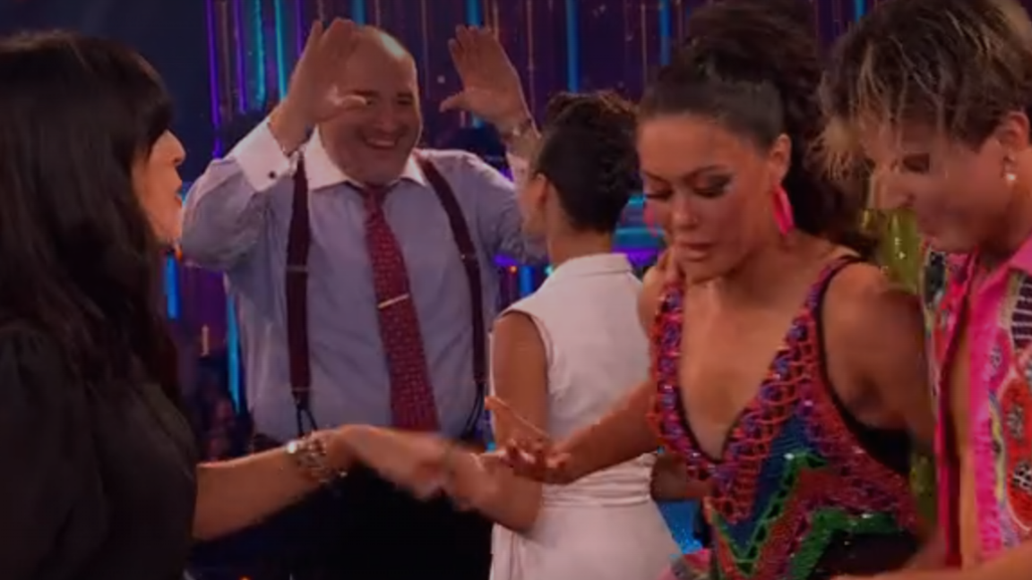 Wynne Evans appears to hold his hands up for a high-five towards Katya Jones