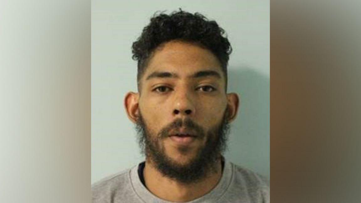 Custody suite photo of Woodger.