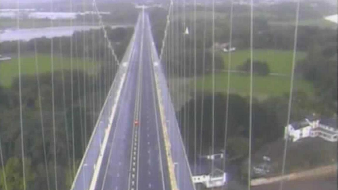 An aerial image taken from a high camera on the M48 Severn Bridge. It shows both lanes of traffic completely empty. 