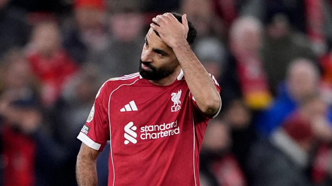 Should Mohamed Salah, dejected after Liverpool's 3-0 loss to Nottingham Forest, now be left out by head coach Arne Slot?
