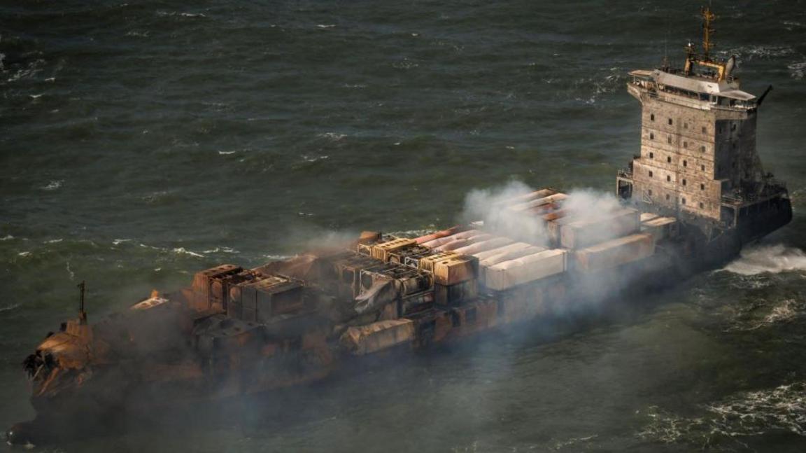 Smoke billowing from the fire-damaged Solong cargo vessel