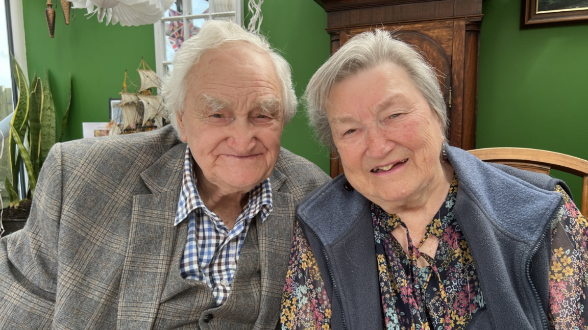 Barry and Betty Jones sitting and smiling