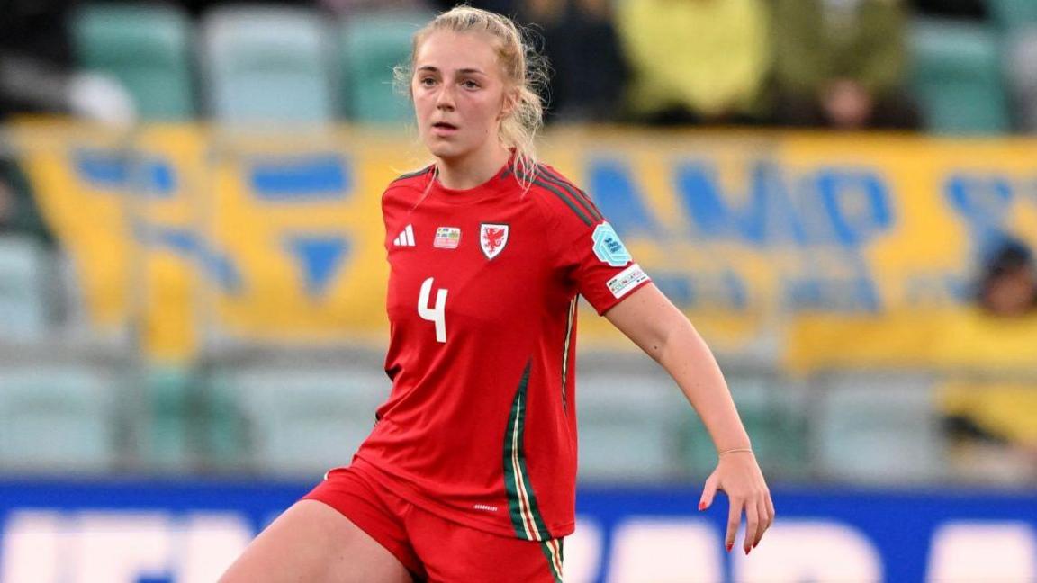 Mayzee Davies playing for Wales