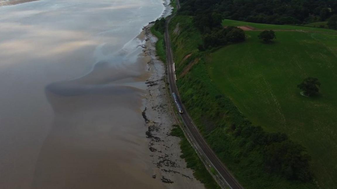 Drone shot of the railway running alongside the Severn Estuary