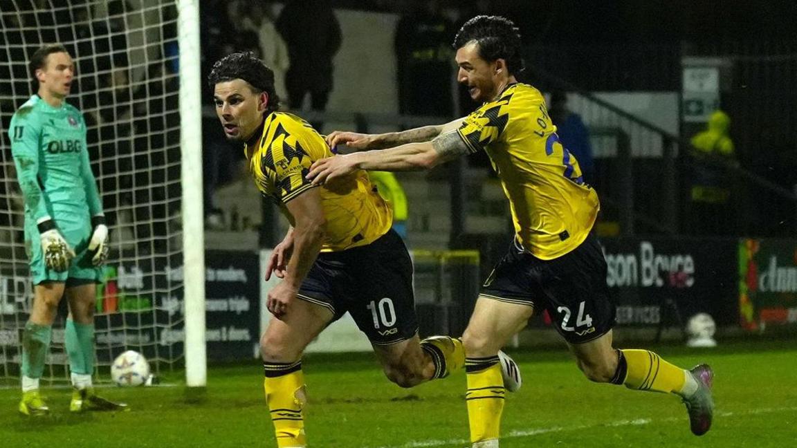 Callum Dolan celebrates