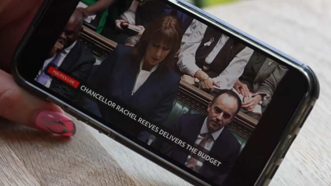 An iphone playing the Budget speech on the BBC News Channel