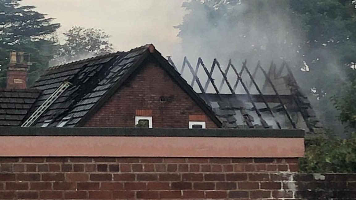 Pictures show damage to the roof after the suspected lightning strike