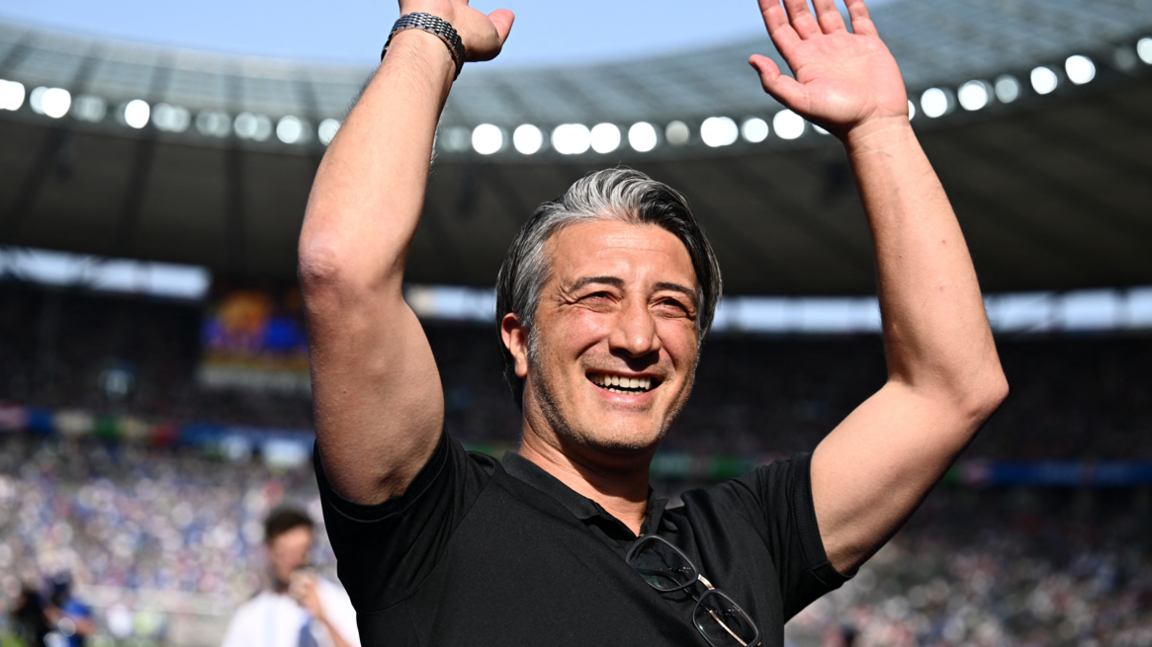 Switzerland boss Murat Yakin acknowledges the fans before the Euro 2024 game with Italy