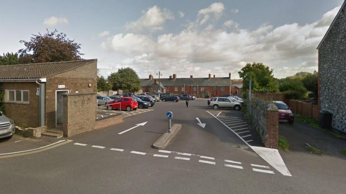 Boden Street car park. It is a wide entrance just off the road with public toilets to the left. 