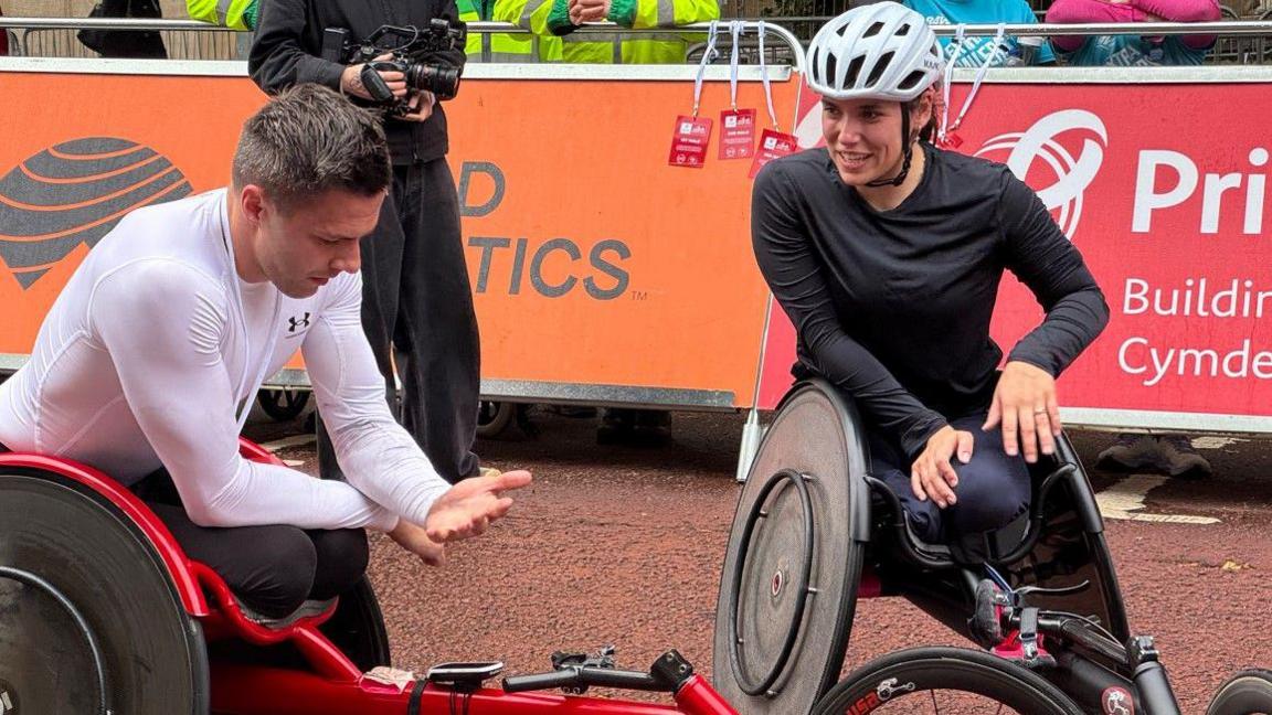 Callum Hall and wife Jade Jones-Hall on the finish line