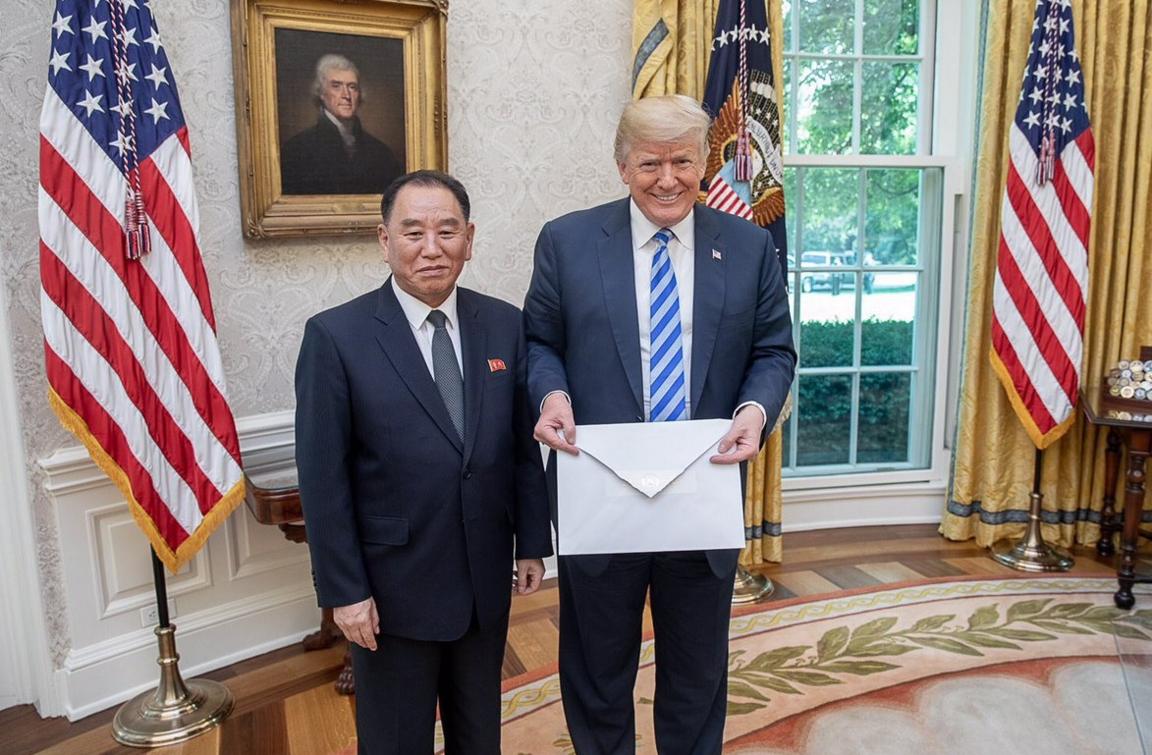 Donald Trump stands with Kim Yong-chol