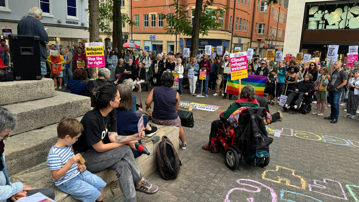 Campaigners in Bonn Square, listening to people talking 