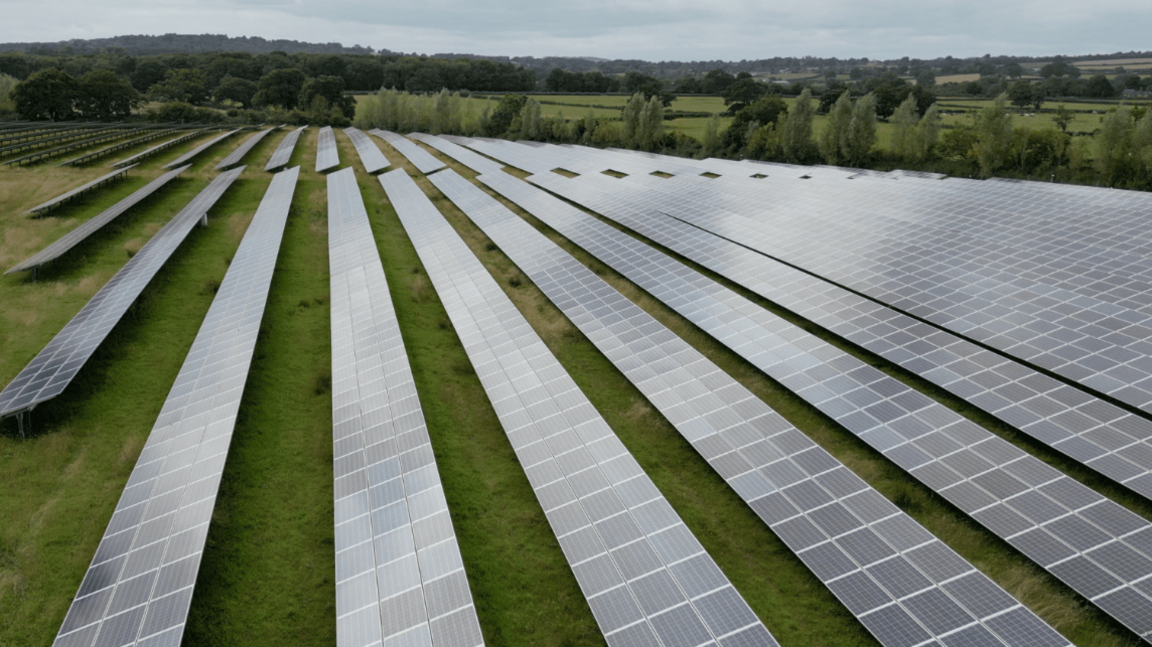 Solar farm are being planned for fields across the East of England. Solar farm near Frome, Somerset on a farm still mostly producing food (75% of land)