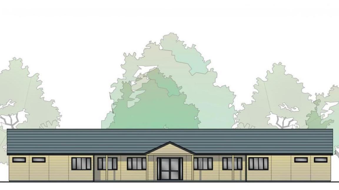 A digital impression of a long one-storey wooden building that will be the new pavilion for Devizes Cricket Club