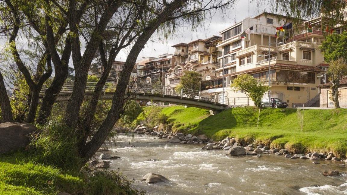 A river running through Cuenca in Ecuador