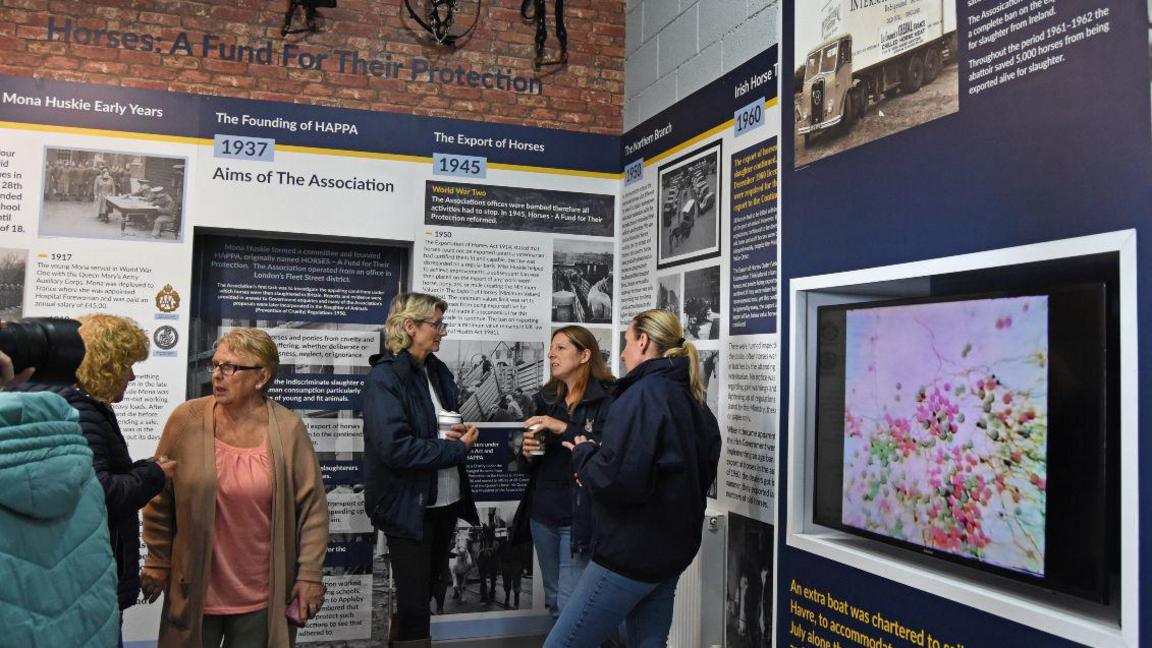 Women chatting at the new museum which showcases the work of the HAPPA charity