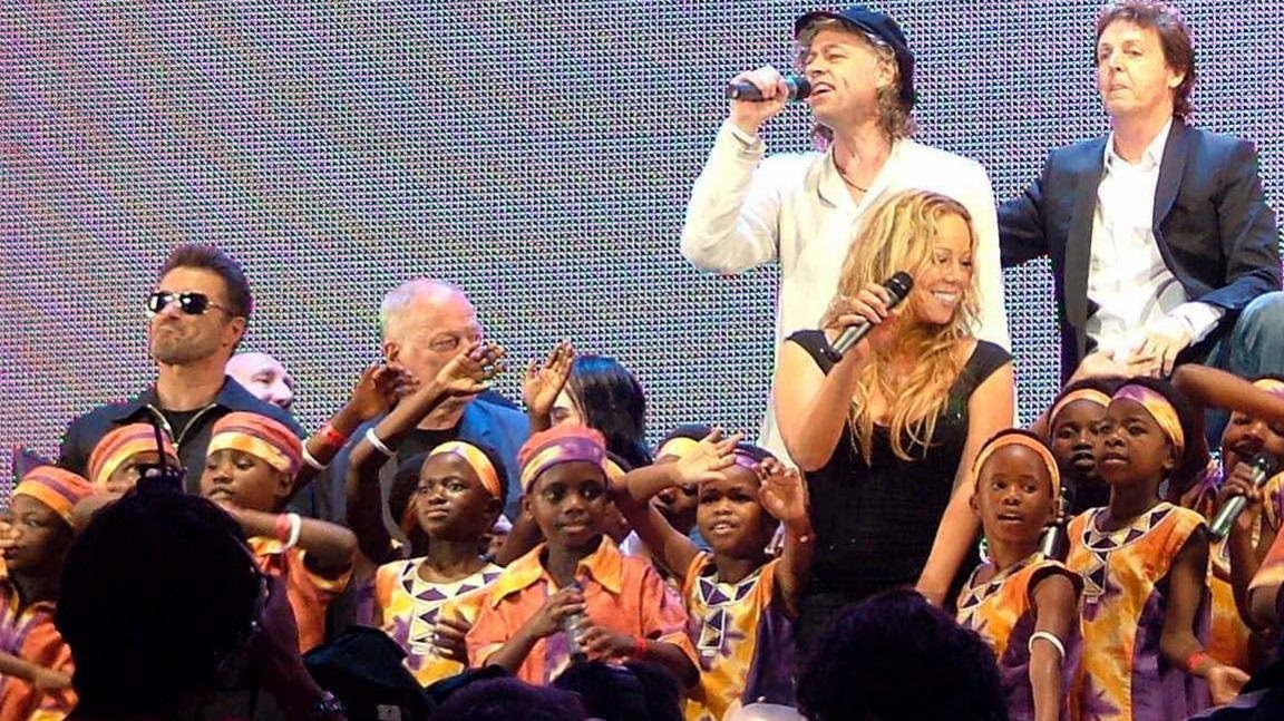 George Michael, Bob Geldof and Mariah Carey, on stage at Live 8, with Paul McCartney, Dave Gilmour and some children