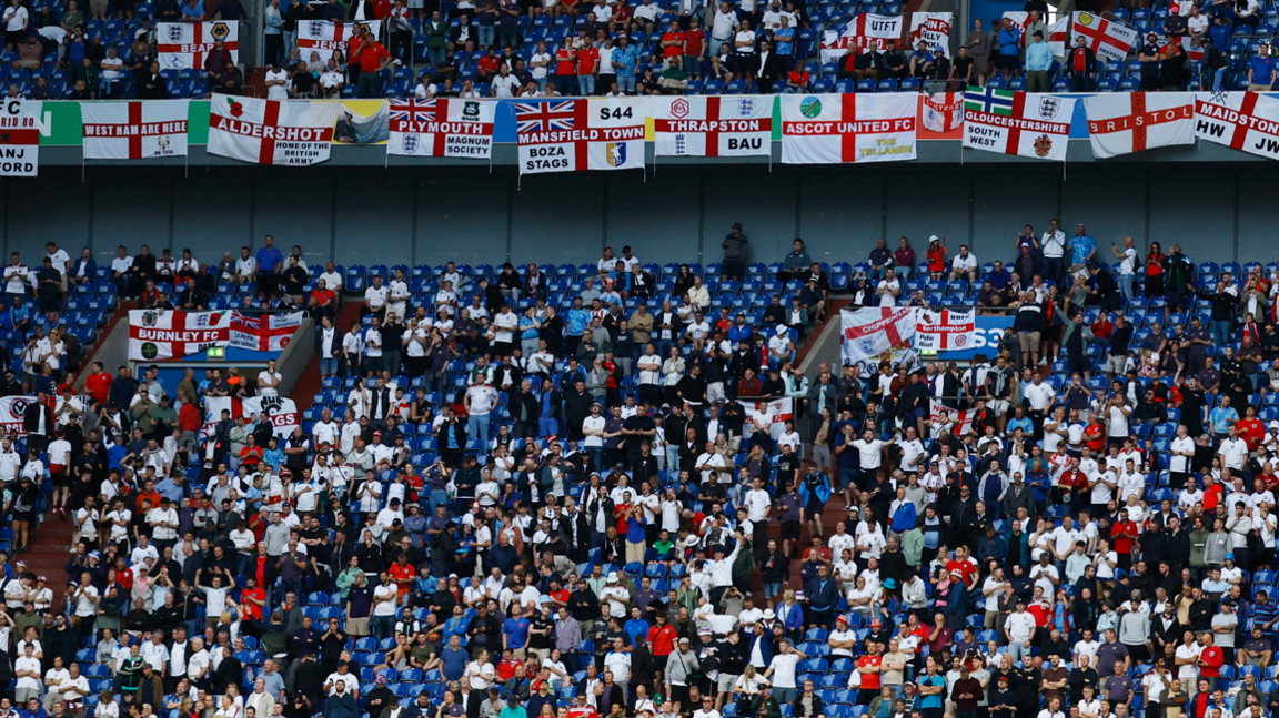 General view of England fans among empty seats inside the stadium before the match.