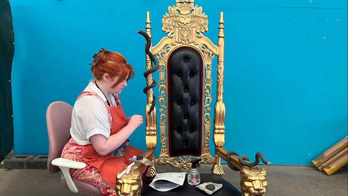 An artist making the 'Reputation' throne 