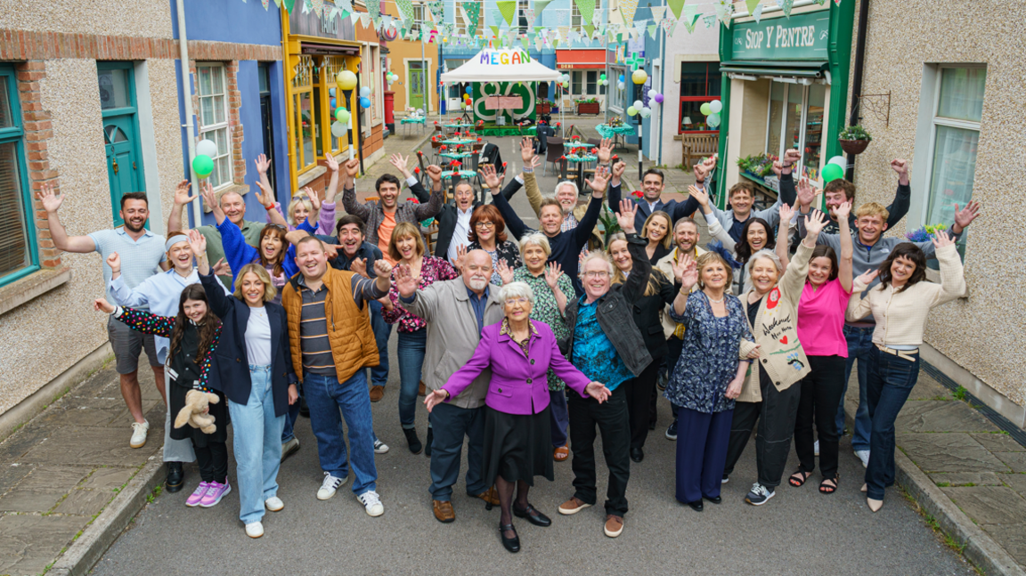 The present-day cast of Pobol y Cwm, on location at BBC Studios in Cardiff Bay