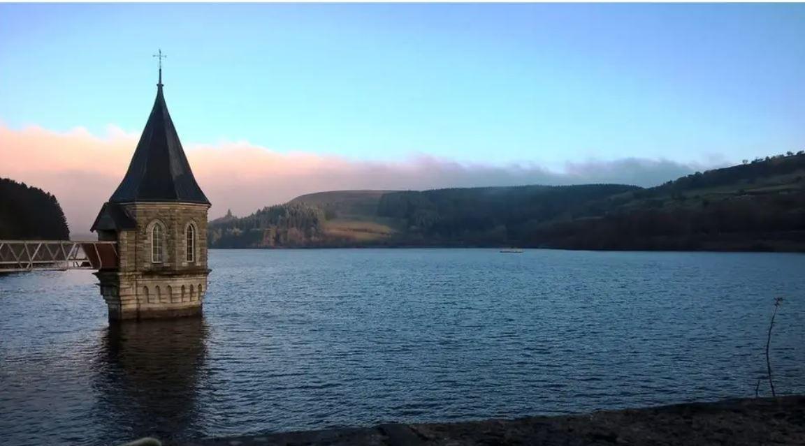Pontsticill reservoir at sunset with a red and blue sky