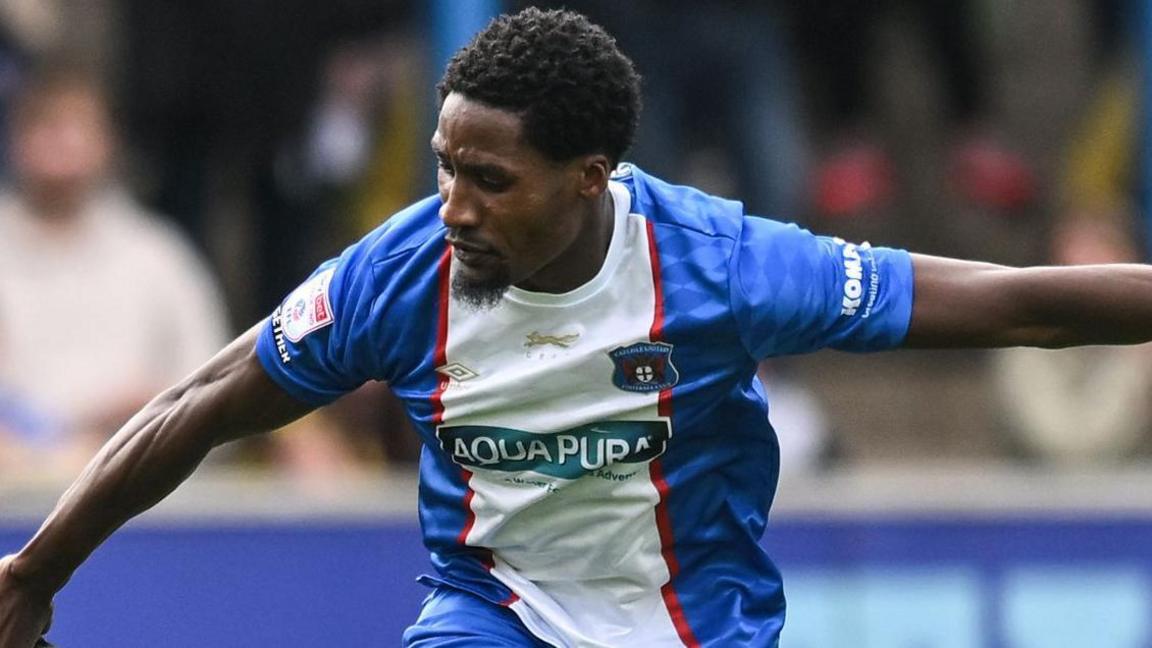 Aaron Hayden playing for Carlisle United