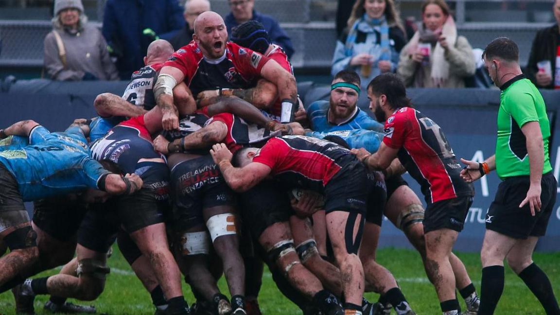 Cornish Pirates' players contest a scrum