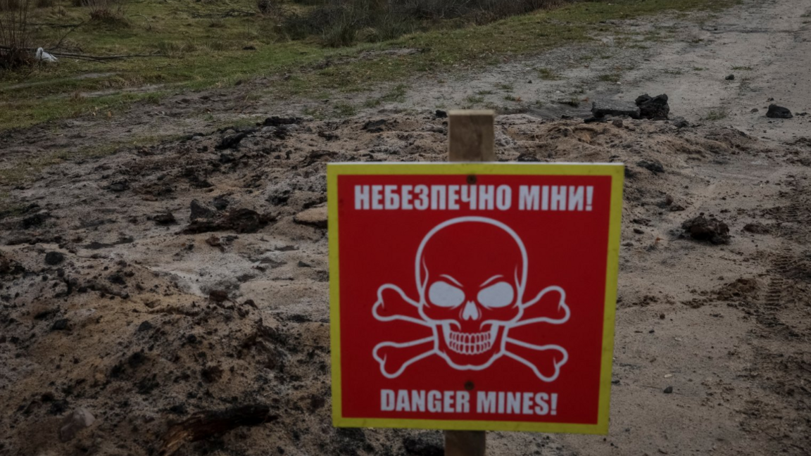 A mine danger sign in Ukraine. File photo