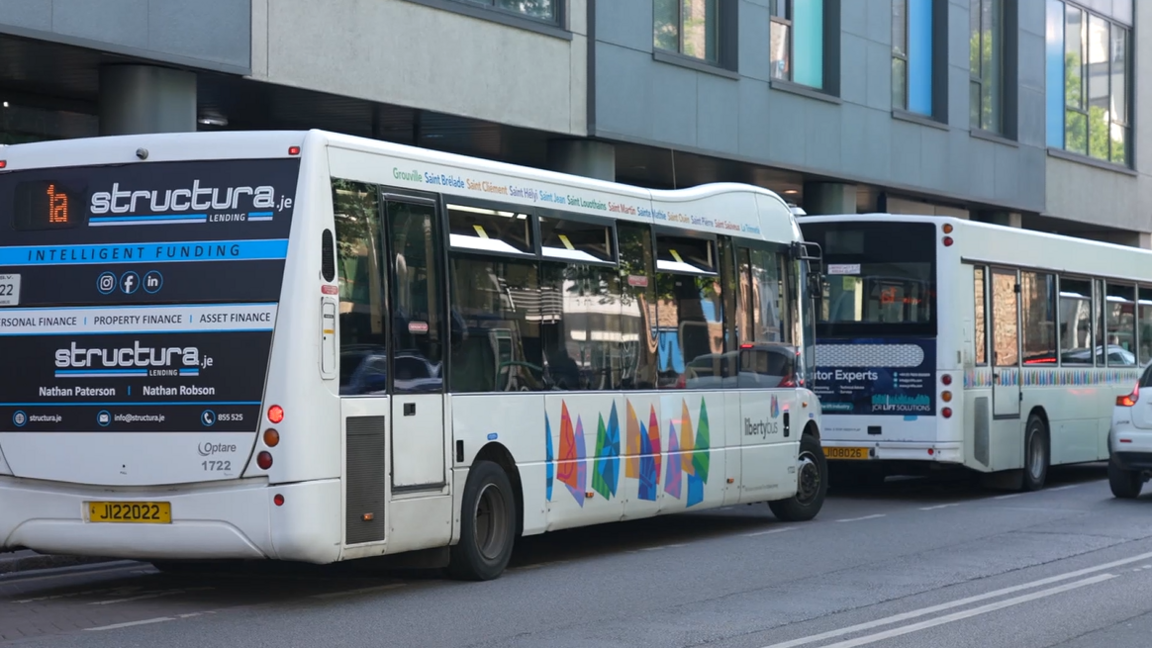 LibertyBus buses outside station