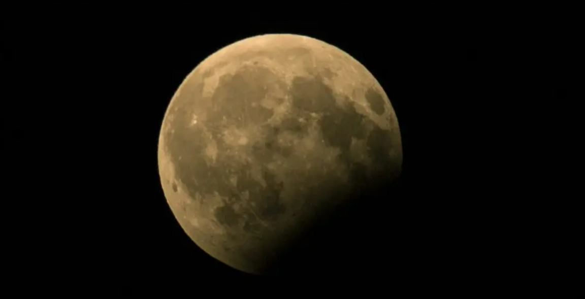 Shadow over the Moon's surface.